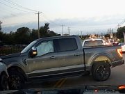 Drivers in Round Rock, TX try to circumvent flush median island. End up crashing into each other.