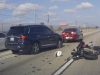 A motorcycle rider on the 105 in Los Angeles lane splits with too high a speed differential and gets into a traffic accident.