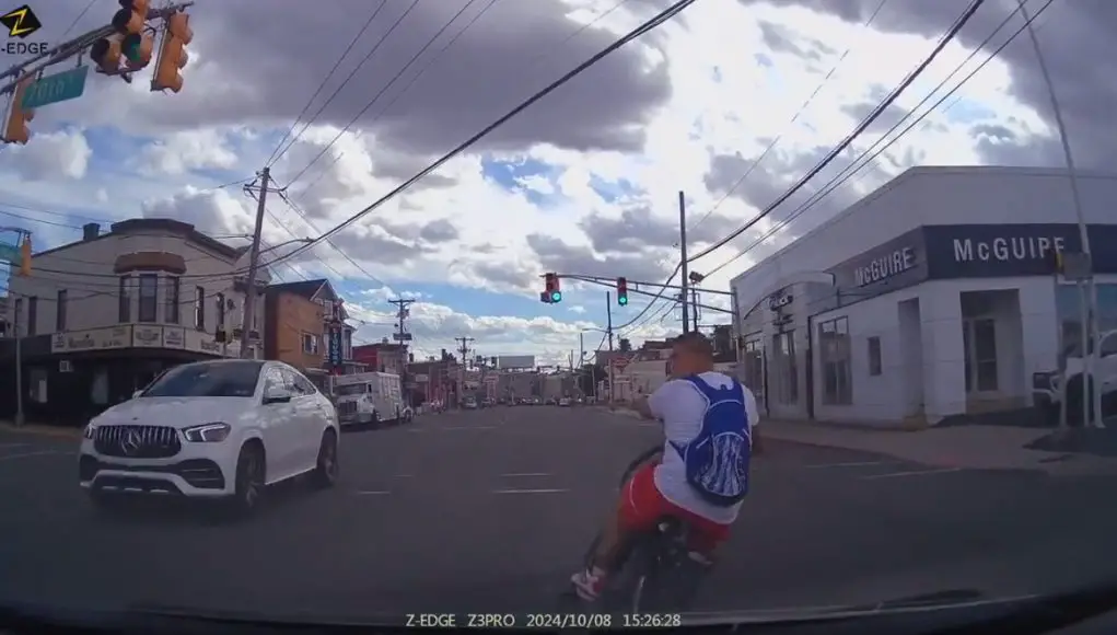 Bike swerver in North Bergen, NJ purposely swerves in front of dashcam owner's car.