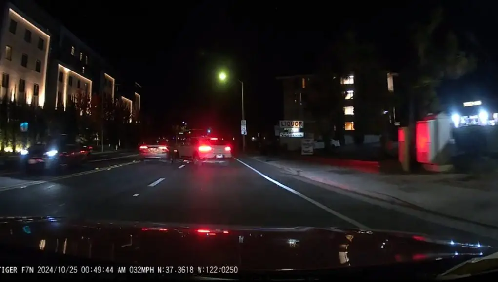 A driver in a Porsche Macan clips a Honda Civic after drifting out of her lane.