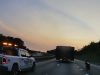 A speeding motorcyclist in Mechancisburg, PA lane splits between a van and semi truck driver towing a 16-foot wide load.