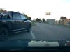 A driver in a black Ram 1500 attempts to use an on-ramp as on off-ramp. Nearly causes collision with dashcam owner.