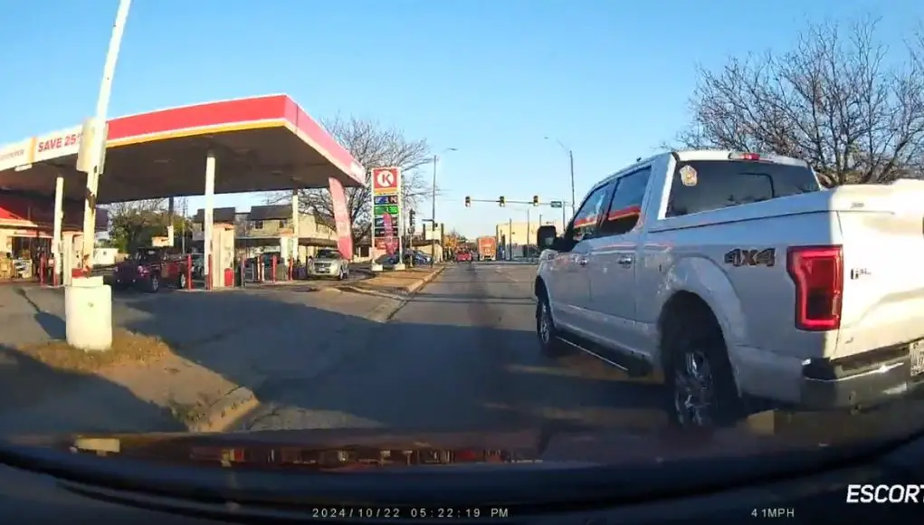 A driver in Pekin, Ill recklessly pulls multi-lane change without yielding properly.