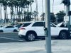 Woman driver in Irvine undeersteers out of control into a traffic light pole.