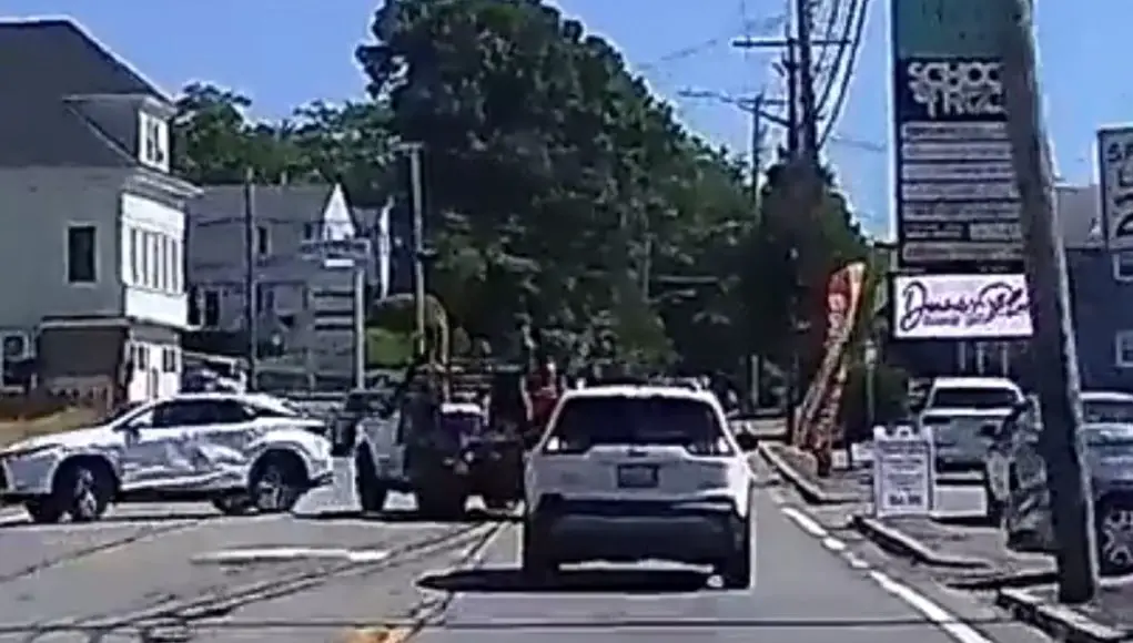 An elderly woman in her Lexus fails to yield to utility truck causing her to sideswipe the side of her Lexus causing thousands in damage.