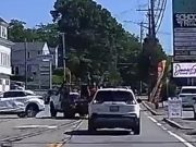 An elderly woman in her Lexus fails to yield to utility truck causing her to sideswipe the side of her Lexus causing thousands in damage.