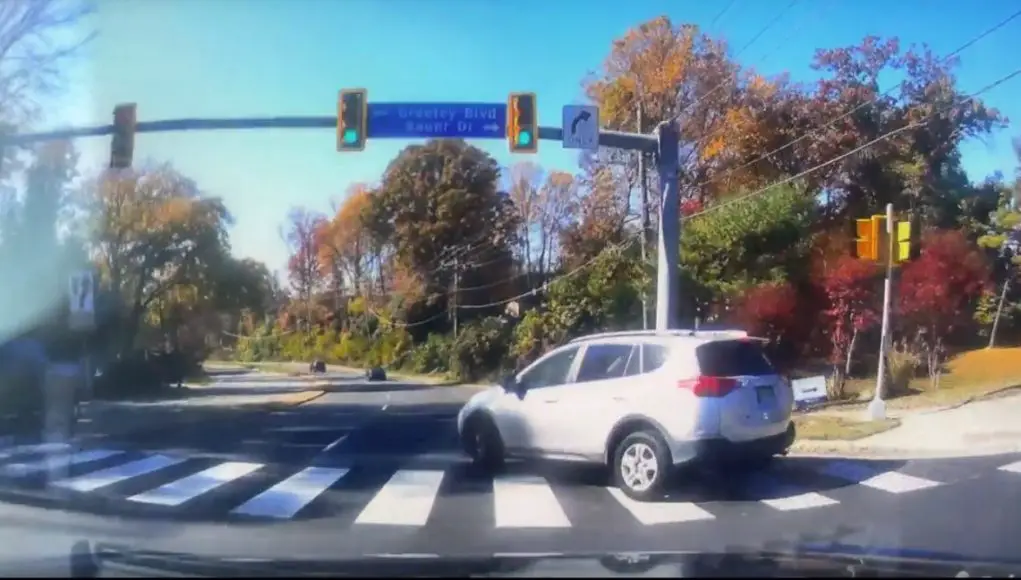 A silver Toyota RAV4 failling to yield on a right-on-red in West Virginia on Old Keene Mill Rd almost getting T-boned.