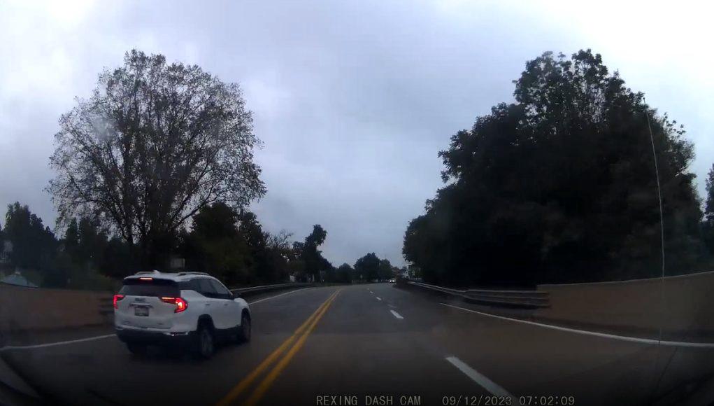 Speeder on the M-60 in Homer, MICH goes against traffic and double solid yellow lines to overtake juset before their single lane road splits into two.