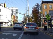 Driver in Jersey City makes right turn using left turn only lane and almost takes out a pedestrian in the process.