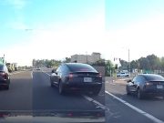 Petty Tesla driver on I-15 off-ramp aborts their merge just to cut off dashcam owner for two seconds.