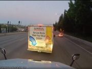 U-Haul driver on I-90 makes multi-lane lane change across the path of a truck driver in a fully loaded semi.