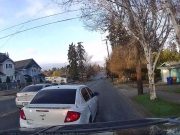 Reckless lane change on East Portland Ave almost forces dashcam owner off the road.