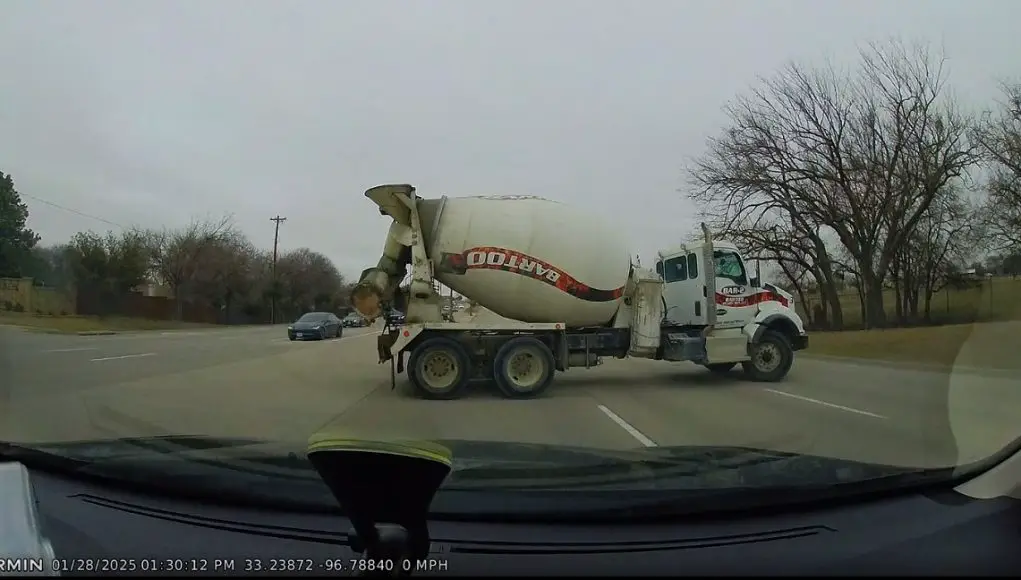 A concrete mixer driver in Prosper, TX is caught on dashcam pulling an illegal u-turn.