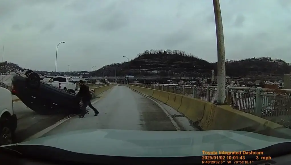 Reckless lane changer on 62nd st. bridge results in them flipping on their roof.