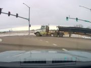 Semi truck driver hauling a heavy load blows through a red light at this Fort Collins, CO intersection.