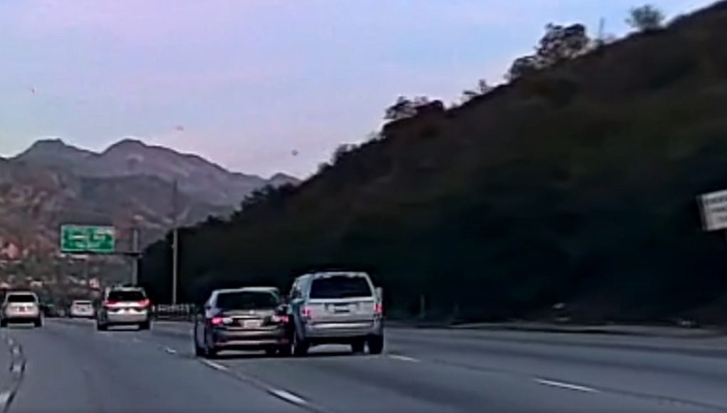 Idiot merging onto the 210 off of La Tuna Canyon Rd does a no-look merge, onlto to hit an innocent driver in a Toyota Corolla.