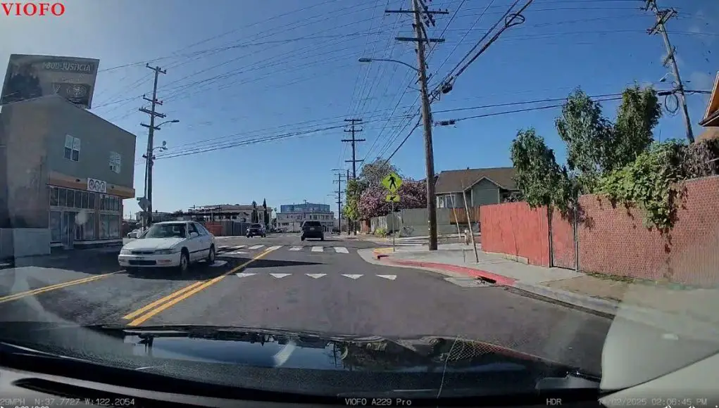 Idiot in Honda Accord caught in Oakland on Foothill BLvd driving down Center Turn Lane in reverse. Blows through red light too.