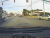 Idiot in Charlotte fails to stop and yield for traffic on right on red on Caroway and Tyron. Almost collides with dashcam owner.