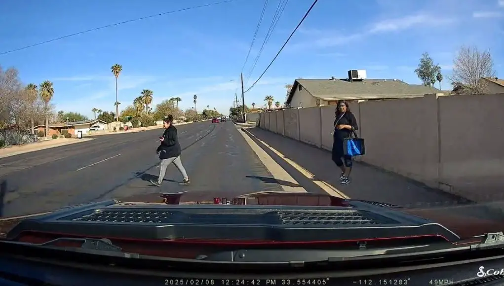 Idiot Pedestrian in Glendale, AZ steps out into traffic in wanton disregard for their own safety. Narrowly avoids getting hit by defensive driving dashcam owner.