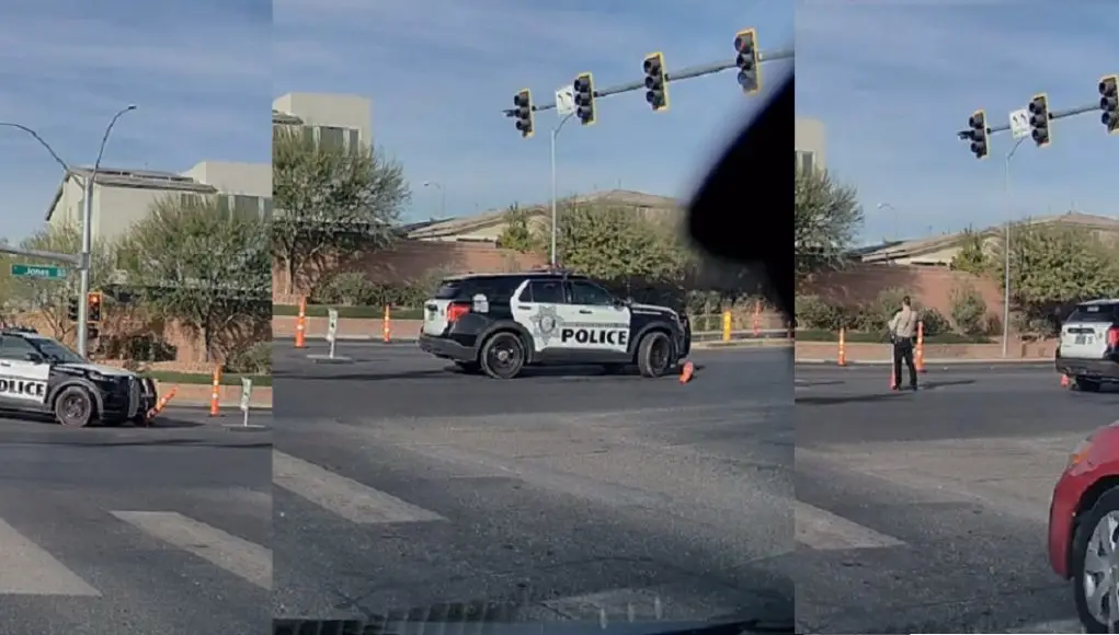 A Las Vegas police officer was caught on dashcam running over a traffic delineator