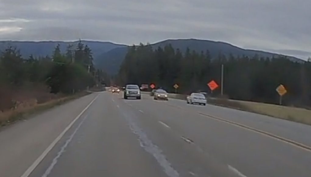 Sequim, WA: Driver makes illegal no passing zone pass over double solid yellow.