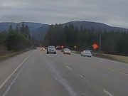 Sequim, WA: Driver makes illegal no passing zone pass over double solid yellow.