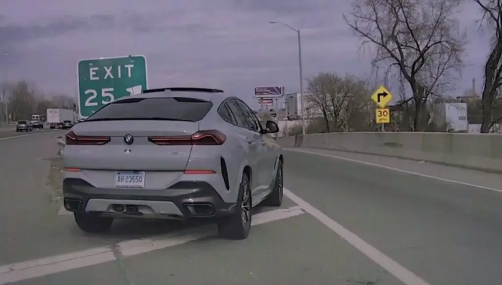 Idiot BMW driver on the Connecticut Turnpike makes dangerous last second exit, narrowly avoiding an accident.
