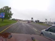 Driver tries to bully Jeep and dashcam owner out of their lane but gets forced to stay in their own lane as dashcam owners stands their ground.
