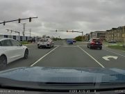 Idiot driver not paying attention on Loudoun County Parkway accidently runs red after left arrow turns green.