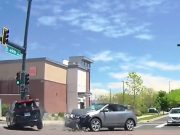 Idiot runs red light nearly 10 seconds after light turned at Tower and 49th. T-boned by driver with right of way.