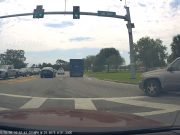 Idiot blows through right on red without stopping, almost causes their own t-bone accident.