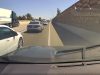 Idiot driver refuses to let dashcam owner slot in front of them on I-5 on-ramp. Nearly sideswipes them.