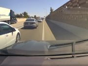 Idiot driver refuses to let dashcam owner slot in front of them on I-5 on-ramp. Nearly sideswipes them.