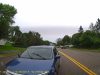 Driver not paying attention on Lake Rd. nearly plows into rear of dashcam owner's car stopped turning left.