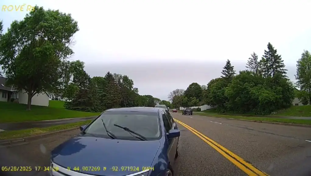 Driver not paying attention on Lake Rd. nearly plows into rear of dashcam owner's car stopped turning left.