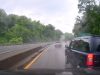 Idiot on Penn-Lincoln Parkway pulls a no-look lane change on rain soaked roads. Almost sideswipes dashcam owner.