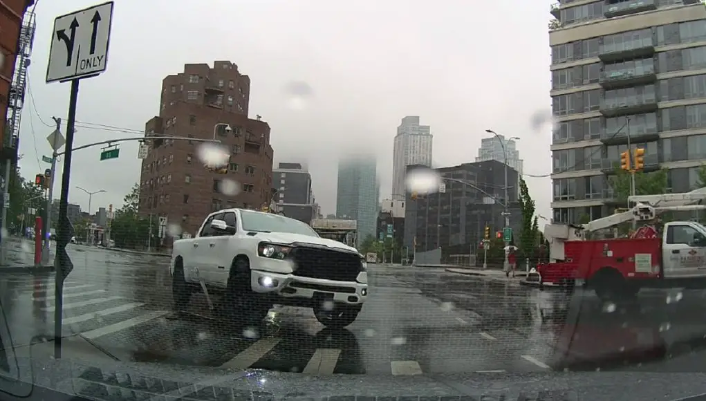 Idiot in Long Island City tries to swerve around other idiot only to end up beached on a bell bollard meant to protect pedestrians.