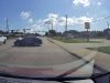 Tesla driver in Rockdale finds out why it's bad idea to turn left by merging into a center turn lane illegally, first. Almost causes their own T-bone accident.