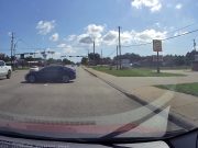 Tesla driver in Rockdale finds out why it's bad idea to turn left by merging into a center turn lane illegally, first. Almost causes their own T-bone accident.