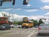 Idiot and possibly distracted driver blows through red, t-bones school bus on Reading and Snider.