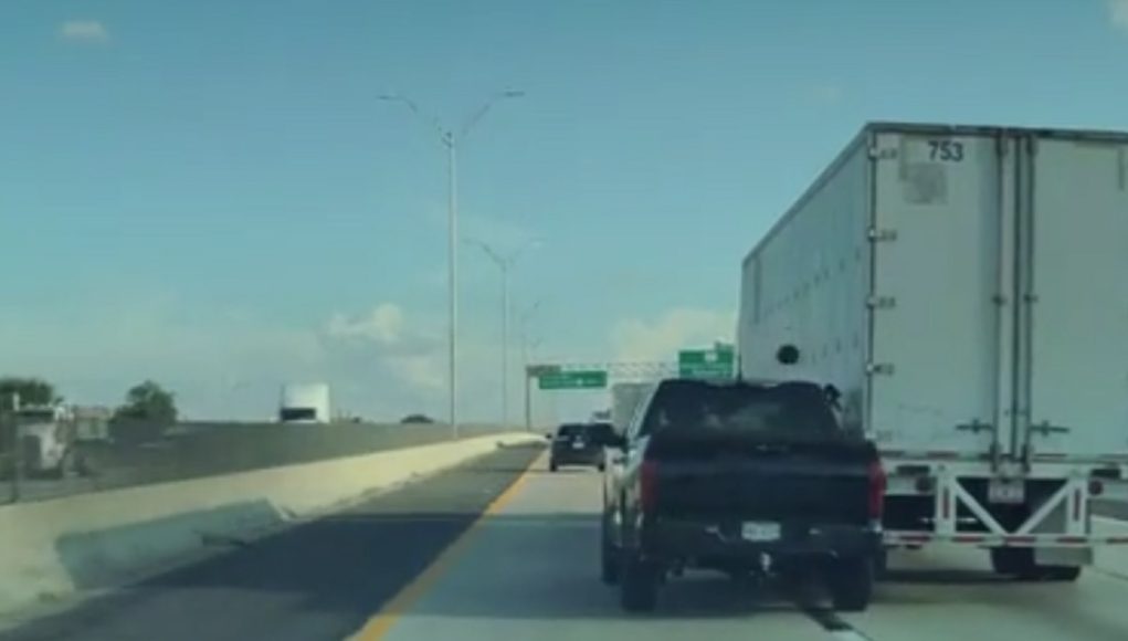 Idiot driver, on their phone or drunk on I-35, slams into side of semi truck's trailer causing thousands in damage.