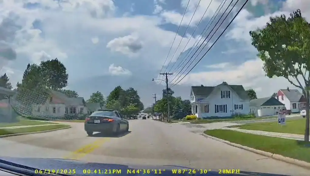 Idiot turning onto Jefferson St. with a stop sign fails to yield and proceeds to road rage at dashcam owner.