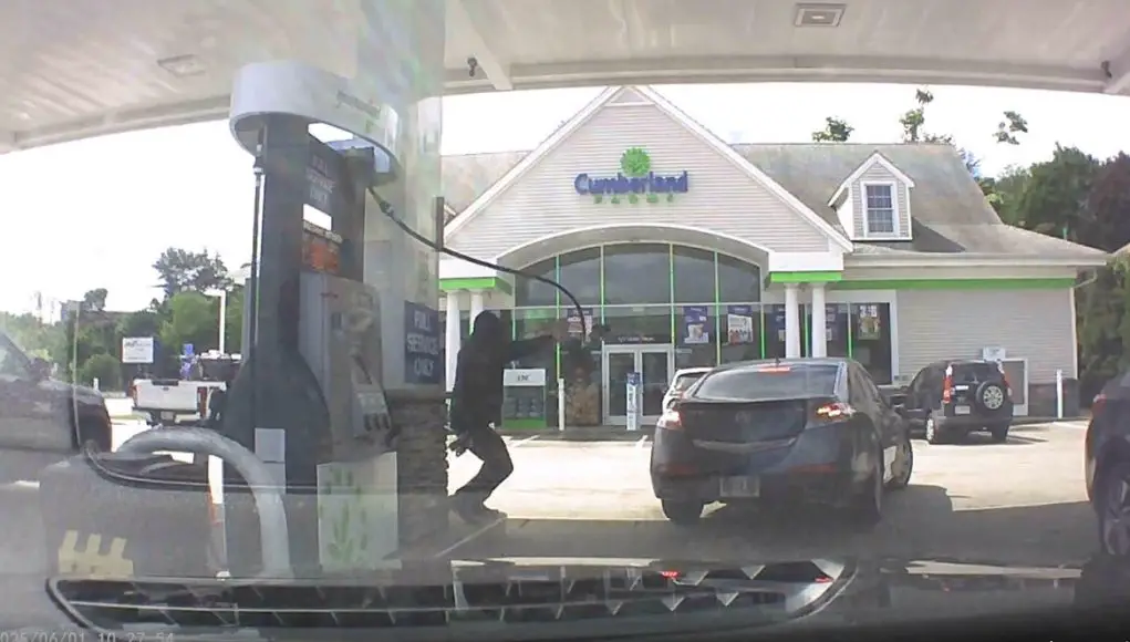 Cumberland Farms gas station attendant in Weymouth catches flying gas nozzle mid-air after customer drives off before nozzle could go back to the pump.
