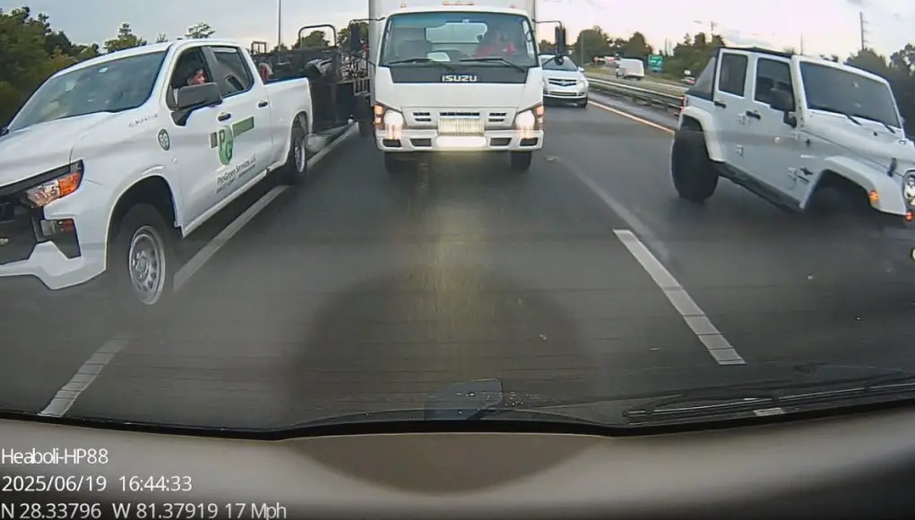 Idiot on the Florida Turnpike in a company truck fails to yield the right of way at a merge point, ends up driving on shoulder instead.