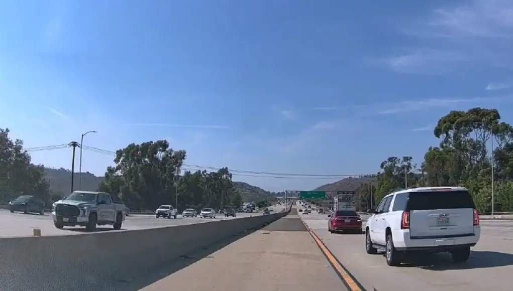 Idiot driver in Pomona on the 57 Orange Freeway almost comes to a complete stop in the fast lane so they don't miss their exit.