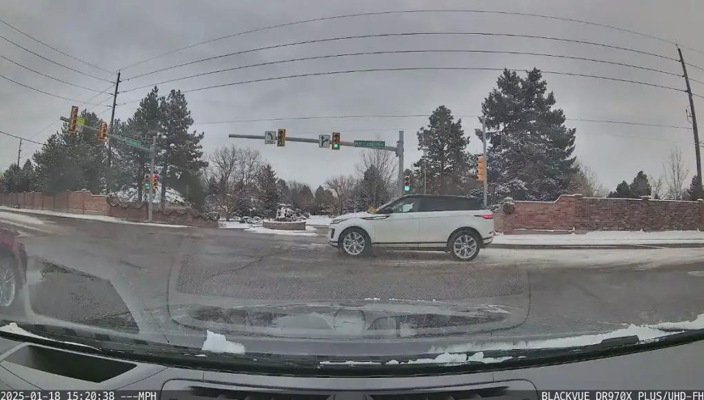 Driver in Range Rover on Platte Canyon Rd comes to an embarassing stop after plowing through intersection