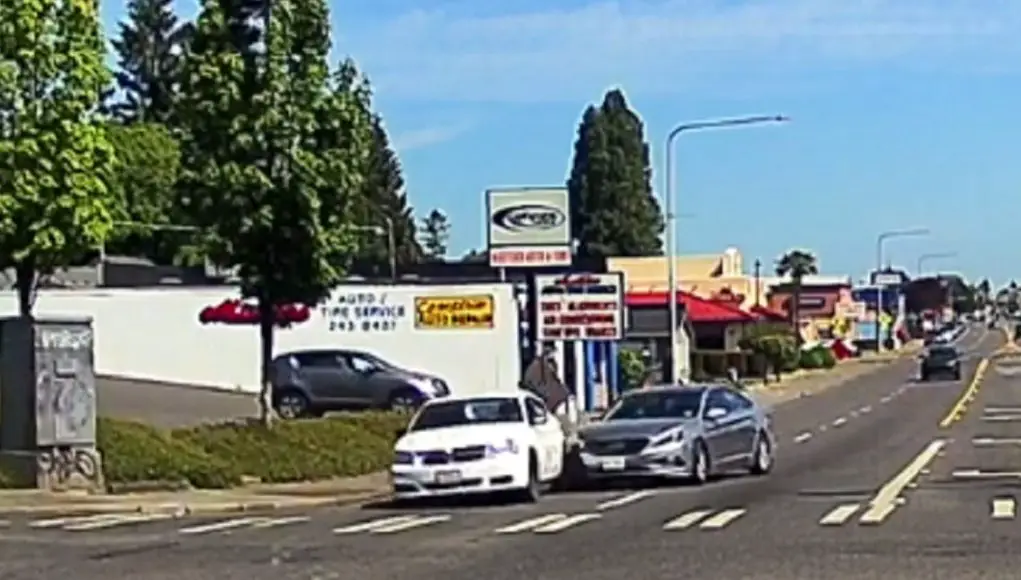 Idiot on 107th St and 16th Ave makes right turn across multiple lanes from left turn only lane. Hits car and commits hit-and-run