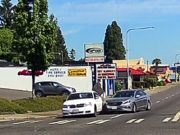 Idiot on 107th St and 16th Ave makes right turn across multiple lanes from left turn only lane. Hits car and commits hit-and-run