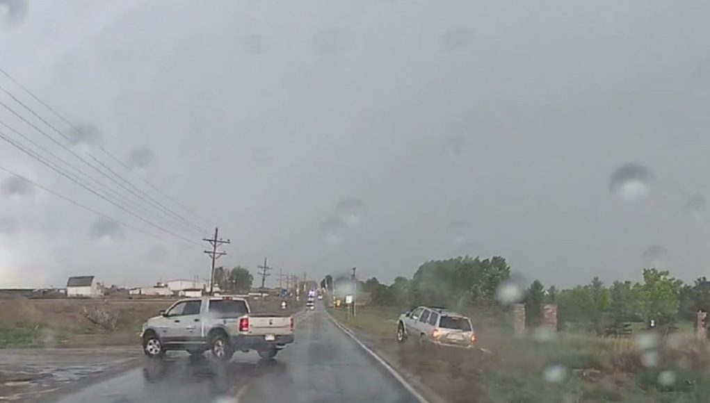 Illegal overtake on Weld County Rd 54 almost ends in disaster as passer chooses to go into ditch instead of casuing t-bone accident.
