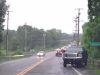 Lifted truck with bald tires on the 55 in Poughkeepsie loses control on rain-soaked road, crashes into guardrail.